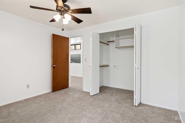 773 Monroe St, Twin Falls, ID 83301 - unfurnished bedroom with light colored carpet, a closet, ceiling fan, and baseboards