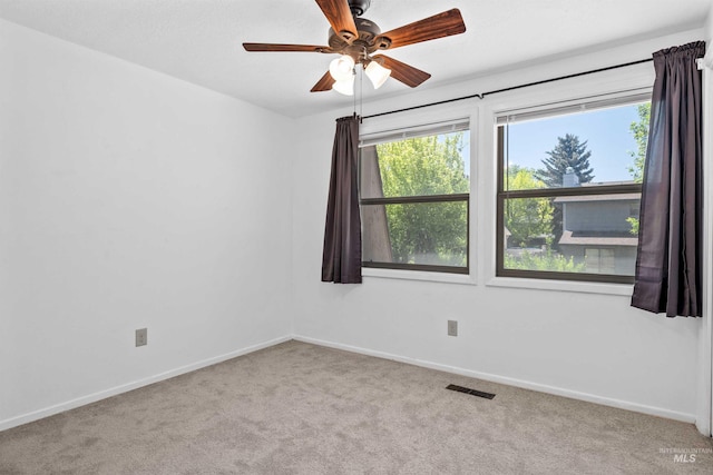 773 Monroe St, Twin Falls, ID 83301 - carpeted spare room featuring a ceiling fan and baseboards