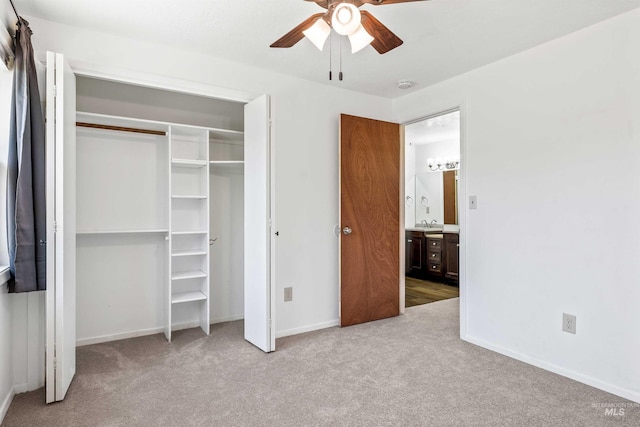 773 Monroe St, Twin Falls, ID 83301 - unfurnished bedroom featuring carpet, baseboards, a closet, a ceiling fan, and a sink