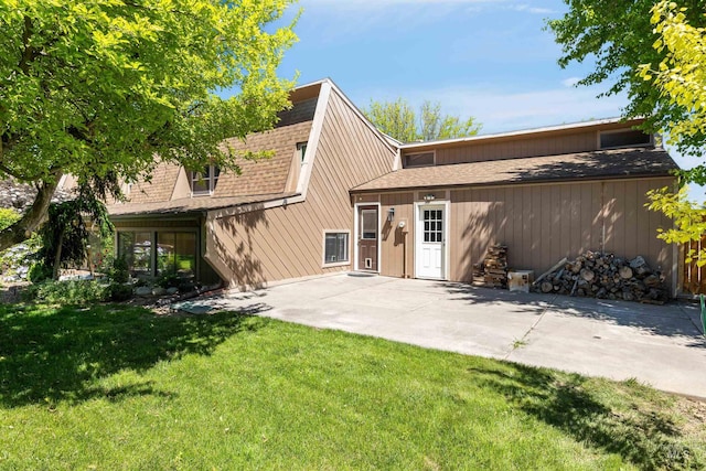773 Monroe St, Twin Falls, ID 83301 - view of front of property featuring a patio area, a front lawn, and roof with shingles
