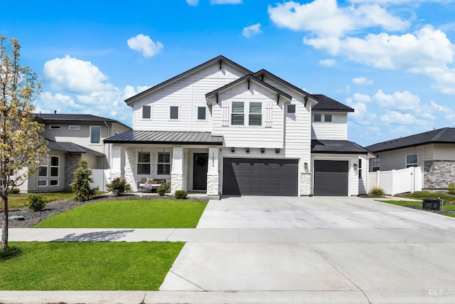 7982 W Suttle Lake Dr, Boise, ID 83714 - modern farmhouse style home with a standing seam roof, fence, a front lawn, concrete driveway, and an attached garage