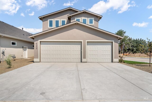 view of front property with a garage