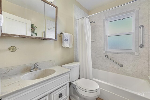 3242 S 2000 E, Wendell, ID 83355 - full bathroom featuring toilet, vanity, and shower / bath combo