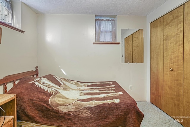 3242 S 2000 E, Wendell, ID 83355 - carpeted bedroom with a closet and a textured ceiling