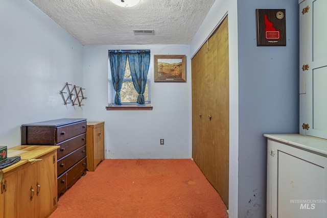 3242 S 2000 E, Wendell, ID 83355 - hall with a textured ceiling, visible vents, and light carpet
