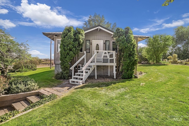 3242 S 2000 E, Wendell, ID 83355 - rear view of house featuring stairs and a yard