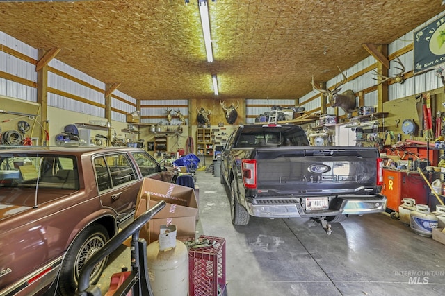 3242 S 2000 E, Wendell, ID 83355 - garage featuring a workshop area and metal wall