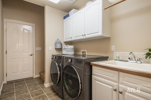 15697 Cupid Dr, Caldwell, ID 83607 - laundry area featuring cabinets, independent washer and dryer, and sink