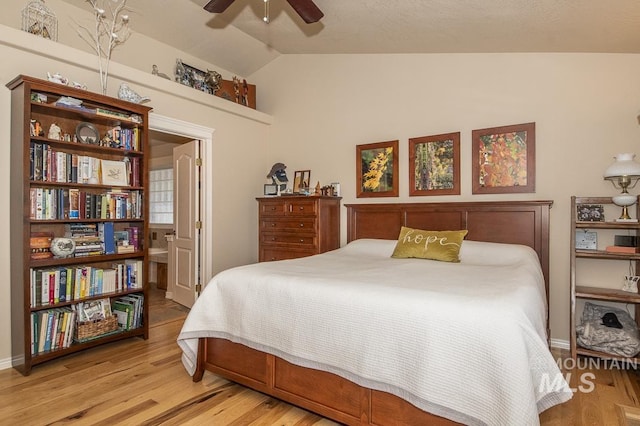 15697 Cupid Dr, Caldwell, ID 83607 - bedroom featuring ceiling fan, light hardwood / wood-style floors, and vaulted ceiling