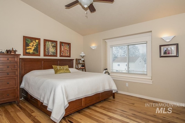 15697 Cupid Dr, Caldwell, ID 83607 - bedroom featuring ceiling fan, lofted ceiling, and light hardwood / wood-style flooring