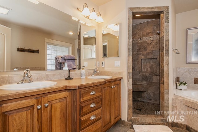 15697 Cupid Dr, Caldwell, ID 83607 - bathroom with vanity and shower with separate bathtub