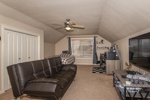 15697 Cupid Dr, Caldwell, ID 83607 - living room featuring ceiling fan, a textured ceiling, light carpet, and vaulted ceiling