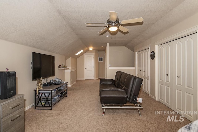 15697 Cupid Dr, Caldwell, ID 83607 - interior space with carpet, ceiling fan, a textured ceiling, and vaulted ceiling