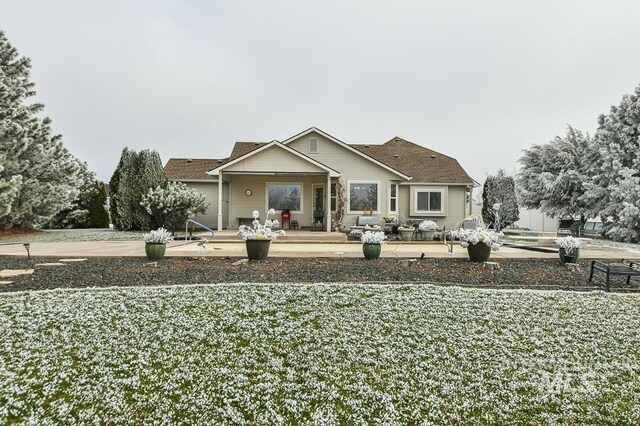 15697 Cupid Dr, Caldwell, ID 83607 - back of property with a patio area