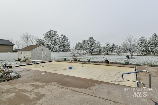15697 Cupid Dr, Caldwell, ID 83607 - exterior space featuring a water view, a storage unit, and a patio area