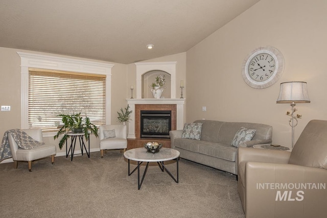 15697 Cupid Dr, Caldwell, ID 83607 - living room with carpet flooring, a fireplace, and vaulted ceiling