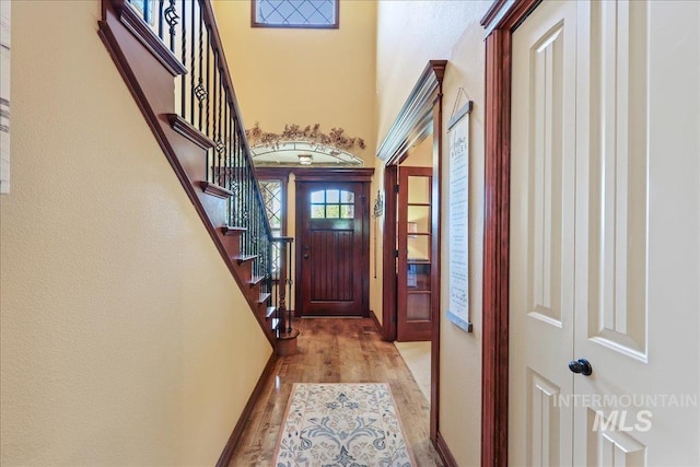 1404 Sandal Crk, Nampa, ID 83686 - foyer entrance with wood finished floors, stairs, and a towering ceiling