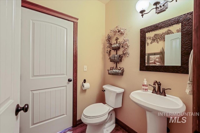 1404 Sandal Crk, Nampa, ID 83686 - half bathroom with toilet and baseboards