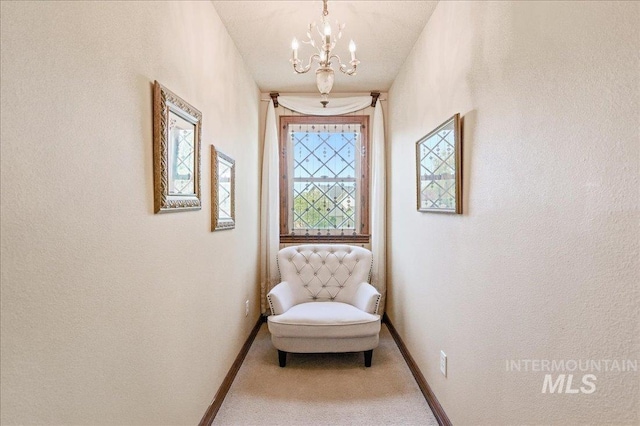 1404 Sandal Crk, Nampa, ID 83686 - living area featuring baseboards, a chandelier, and carpet flooring