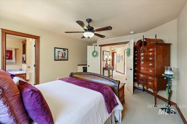 1404 Sandal Crk, Nampa, ID 83686 - bedroom featuring light carpet, ceiling fan, a textured ceiling, and ensuite bathroom