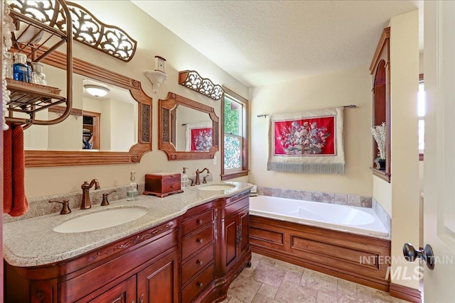 1404 Sandal Crk, Nampa, ID 83686 - full bath with a textured ceiling, a garden tub, and double vanity
