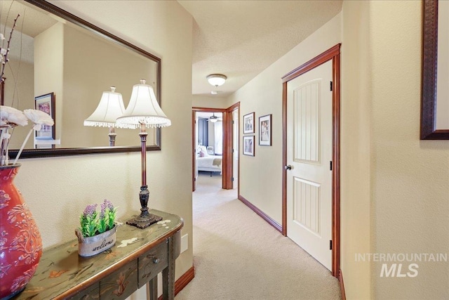 1404 Sandal Crk, Nampa, ID 83686 - hallway featuring carpet flooring and baseboards