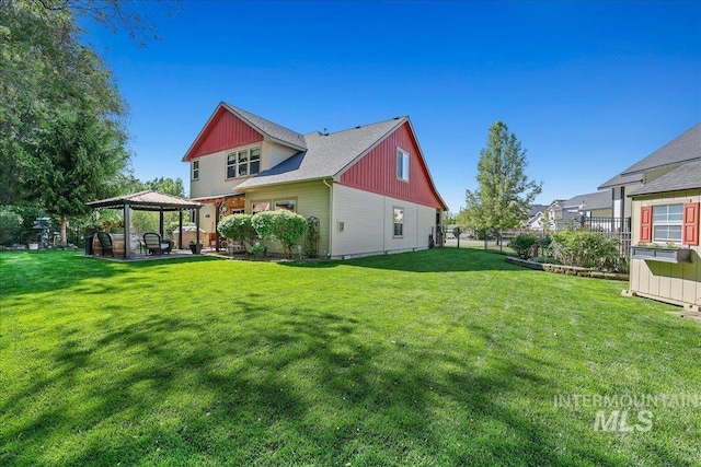 1404 Sandal Crk, Nampa, ID 83686 - rear view of house featuring a gazebo and a patio