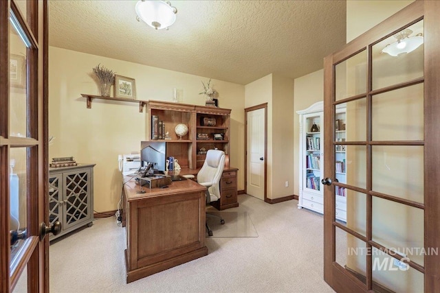 1404 Sandal Crk, Nampa, ID 83686 - home office with french doors, carpet floors, a textured ceiling, and baseboards