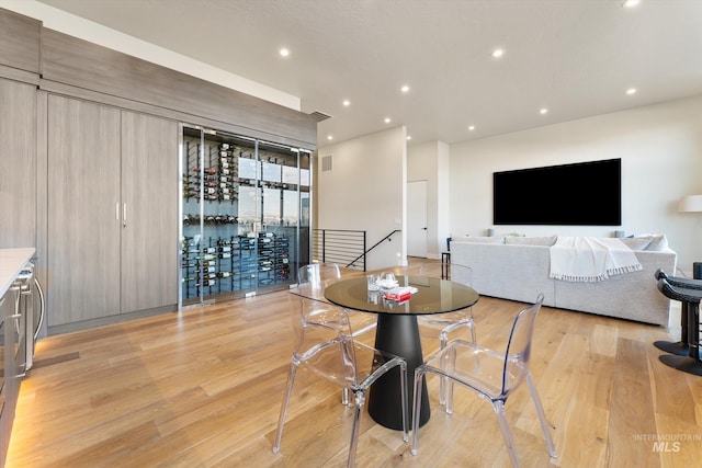 dining area with light wood-type flooring