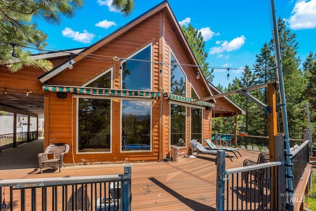 10389 Gamann Dr, Cascade, ID 83611 - rear view of property featuring a wooden deck