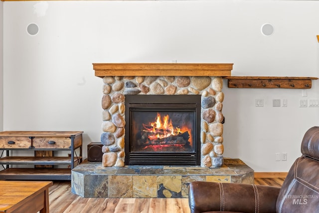 10389 Gamann Dr, Cascade, ID 83611 - detailed view of a fireplace and wood finished floors