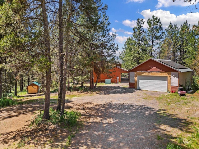 10389 Gamann Dr, Cascade, ID 83611 - view of home's exterior with an outbuilding and dirt driveway