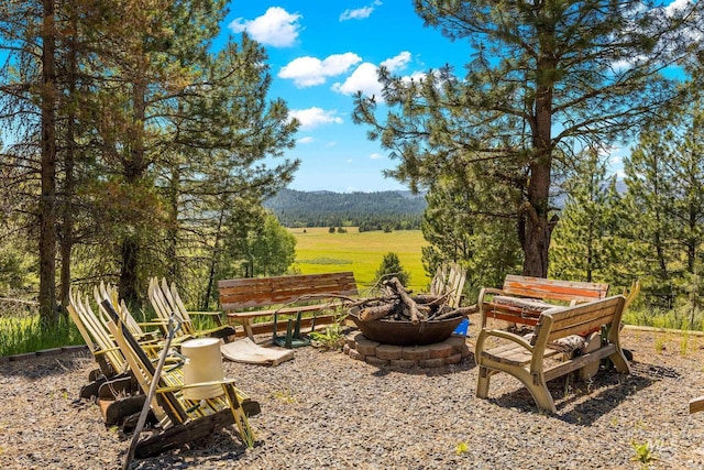 10389 Gamann Dr, Cascade, ID 83611 - view of yard featuring a fire pit