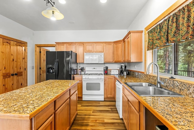 10389 Gamann Dr, Cascade, ID 83611 - kitchen featuring white appliances, wood finished floors, a kitchen island, and tile countertops