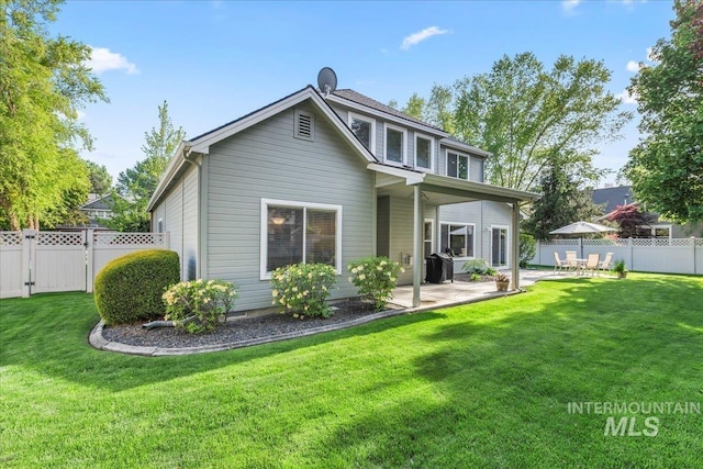 back of property featuring a patio area