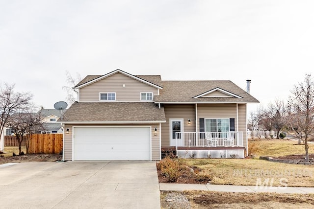 view of front of home with an attached garage, fence, roof with shingles, covered porch, and driveway