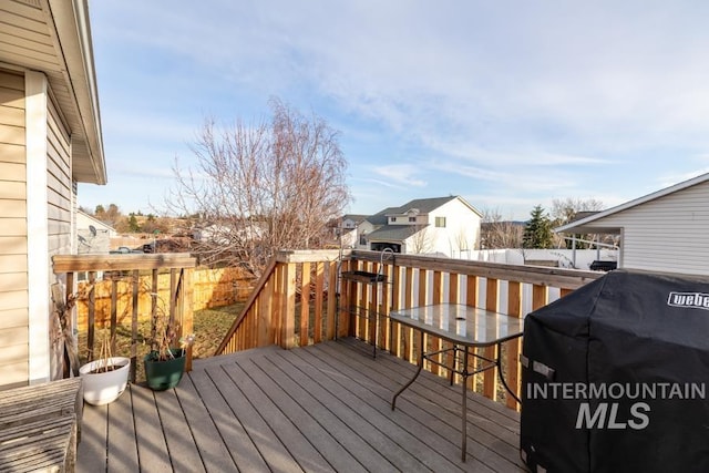 wooden terrace with grilling area