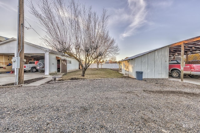 view of side of property with an outdoor structure