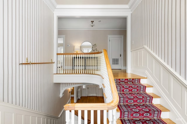 1312 E Warm Springs Ave, Boise, ID 83712 - stairs with wallpapered walls and ornamental molding