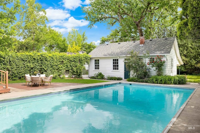 1312 E Warm Springs Ave, Boise, ID 83712 - outdoor pool featuring an outdoor structure
