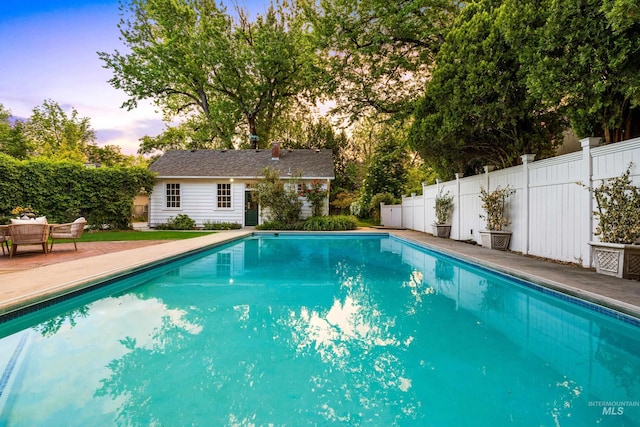 1312 E Warm Springs Ave, Boise, ID 83712 - view of swimming pool featuring an outbuilding, a fenced backyard, and a patio