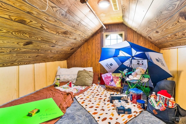 game room featuring wooden walls, lofted ceiling, and carpet floors