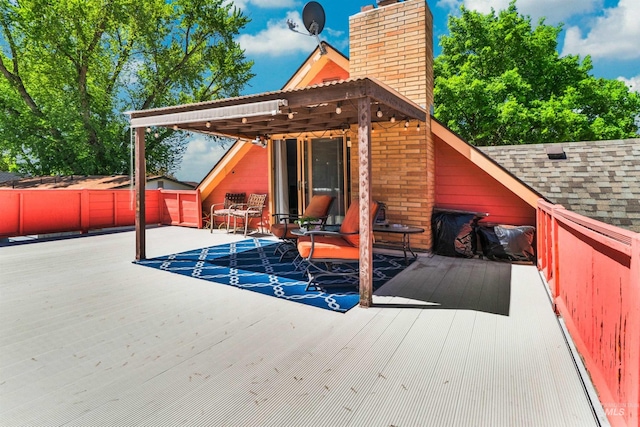 deck featuring fence