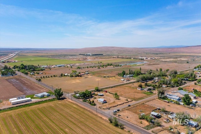 764 NW Beaman St, Mountain Home, ID 83647 - aerial view of sparsely populated area with extensive farmland and a mountainous background