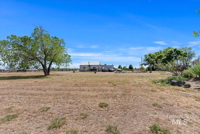 764 NW Beaman St, Mountain Home, ID 83647 - view of yard featuring a rural view