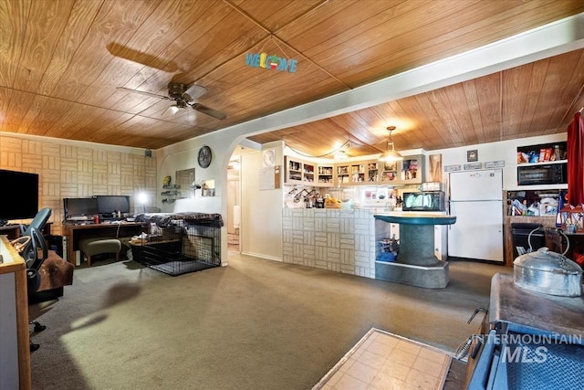 764 NW Beaman St, Mountain Home, ID 83647 - living area featuring wood ceiling, an office area, ceiling fan, and arched walkways