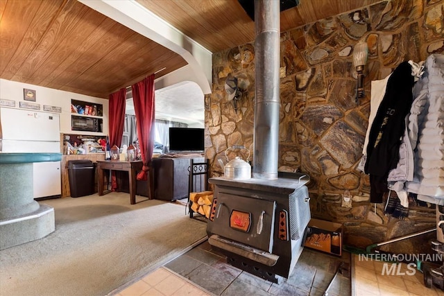 764 NW Beaman St, Mountain Home, ID 83647 - living room with wooden ceiling and a wood stove