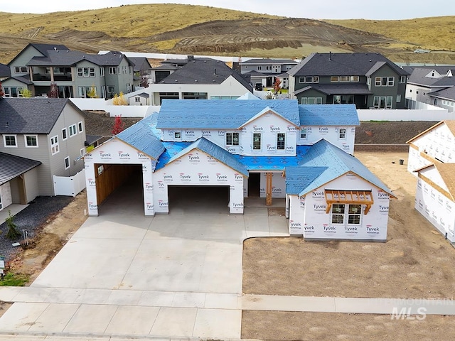 view of front of home featuring a mountain view