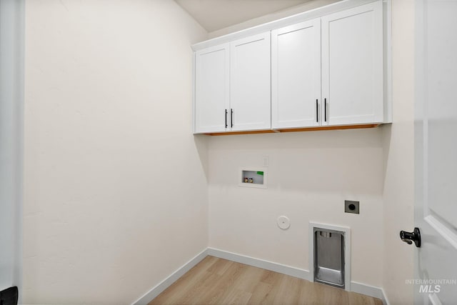 laundry room featuring electric dryer hookup, light wood-type flooring, cabinet space, baseboards, and hookup for a washing machine