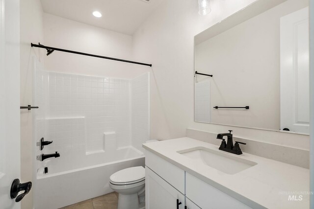 bathroom with vanity, recessed lighting, shower / washtub combination, tile patterned floors, and toilet